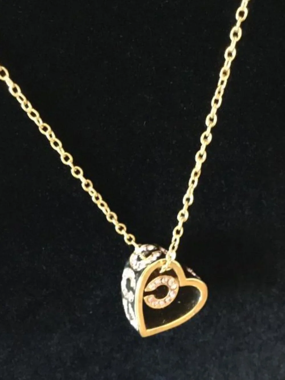 Coach Gold-tone Heart Pendant Necklace with Pink Crystals